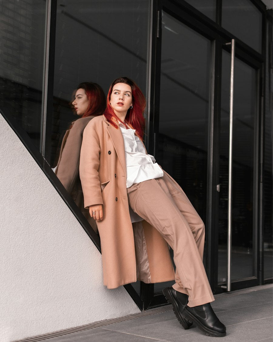 Woman in a camel trench coat
